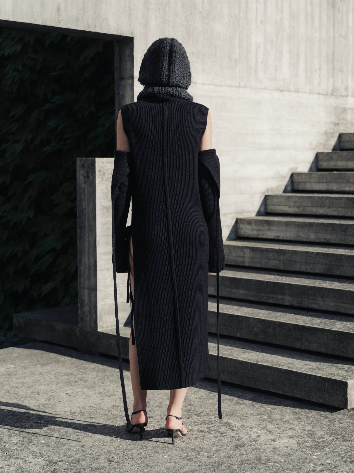 Scaldabraccia in lana merino extra fine con fasce lunghe