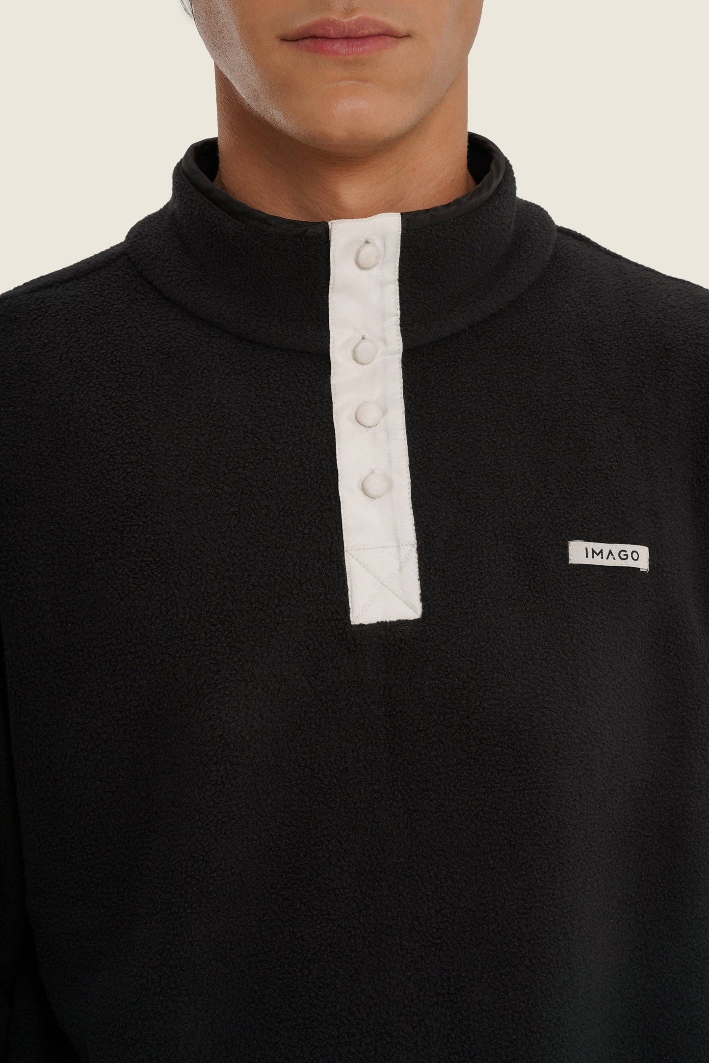 Maglione in pile nero unisex in cotone organico