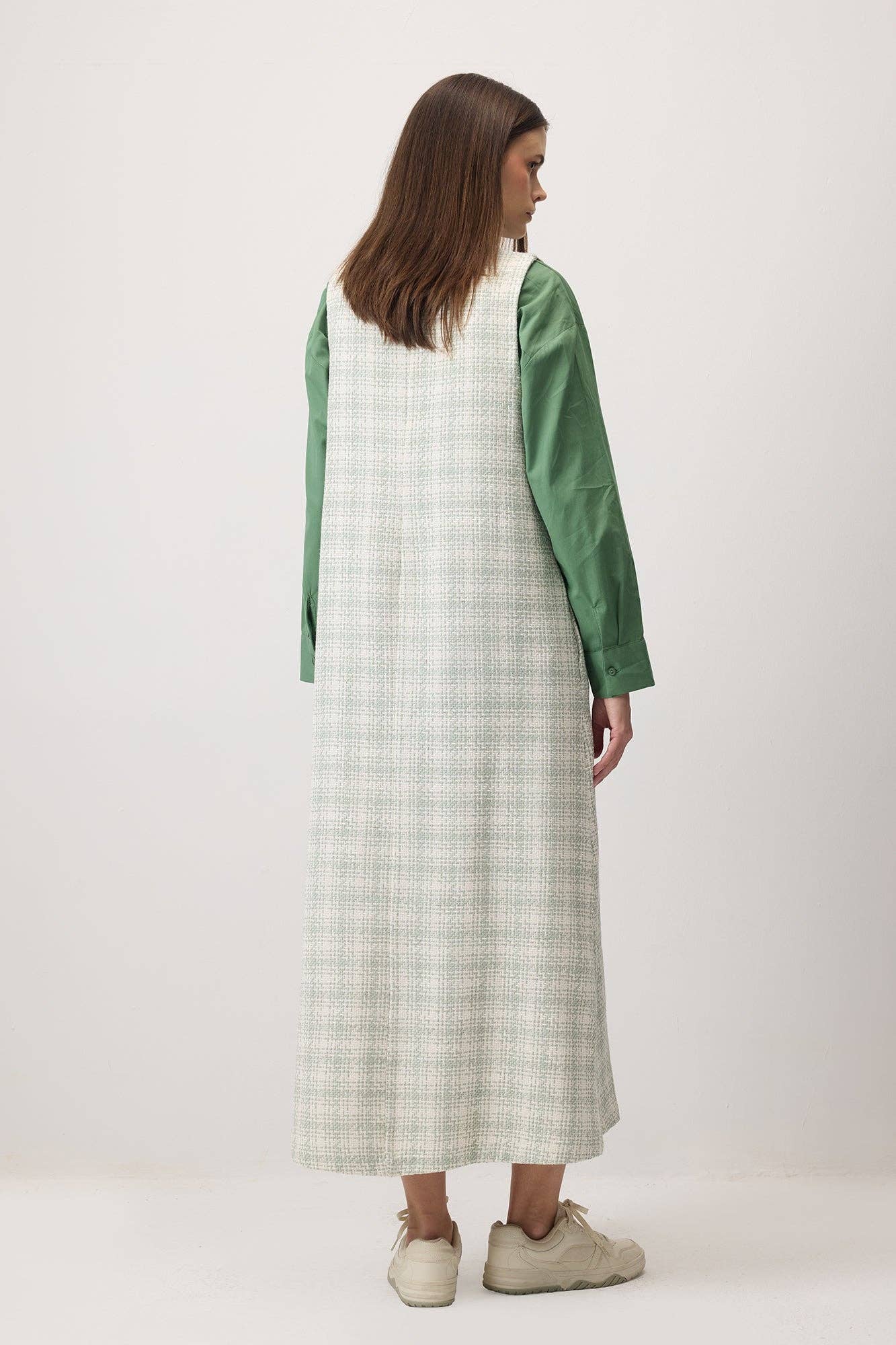 Abito lungo smanicato in tweed