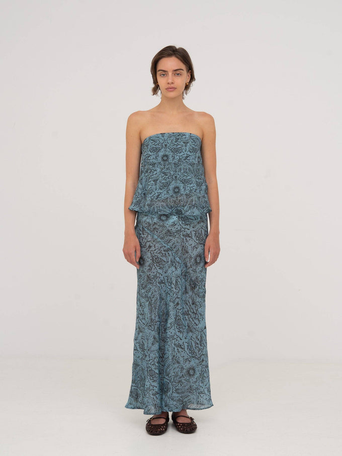 Top a fascia blu con stampa celestiale