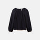 Blusa in tessuto effetto stropicciato con maniche a palloncino