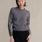 Maglione girocollo in tweed cropped in lana riciclata
