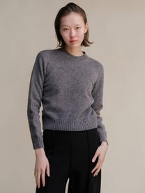Maglione girocollo in tweed cropped in lana riciclata