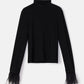 Body nero elegante a collo alto con polsini in piume