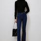 Jeans a zampa vita alta in denim stretch