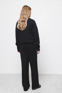 Pantaloni palazzo in maglia con vita elasticizzata