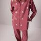 Camicia oversize rosa con applicazioni floreali 3D