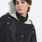 Parka lungo da donna con cappuccio e tasche