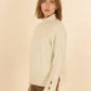 Maglione dolcevita in maglia Matis con polsini a bottoni