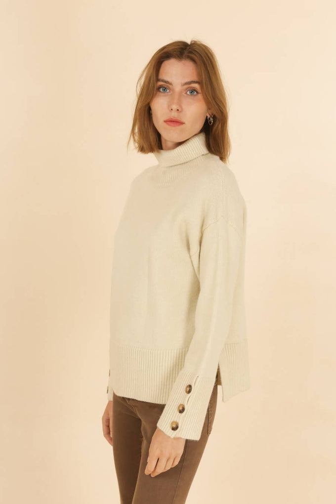 Maglione dolcevita in maglia Matis con polsini a bottoni