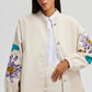 Giacca in denim naturale con ricamo floreale