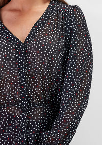 Blusa a pois con scollo a V e maniche morbide