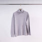 Maglione a collo alto in maglia con maniche aderenti