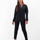 Blusa nera con inserti in pizzo e laccio al collo