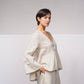Blusa ampia in lino con scollo a V