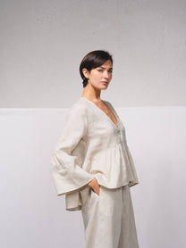 Blusa ampia in lino con scollo a V
