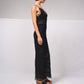 Tuta intera in pizzo con scollo a V e spalline incrociate