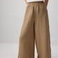 Pantaloni palazzo in cotone con bordi sfrangiati