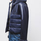 Giacca imbottita in eco-pelle con cappuccio e zip