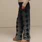 Jeans donna a gamba ampia con stampa stelle