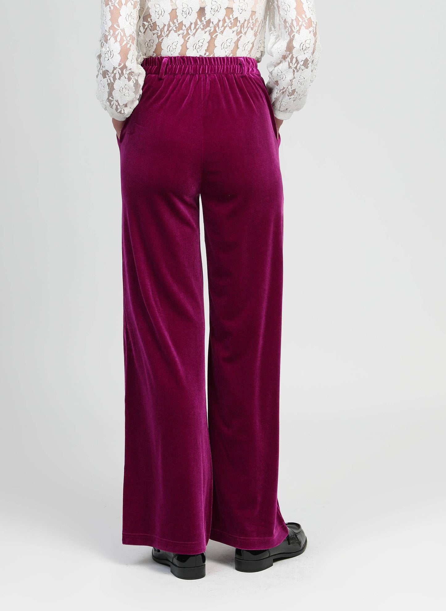 Pantaloni a zampa in velluto viola