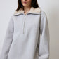 Felpa oversize con collo in ecopelliccia e mezza zip in cotone