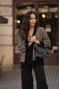 Cardigan animalier in maglia con bordi neri
