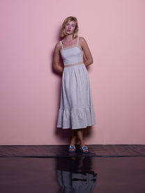 Abito midi in lurex con spalline e balza