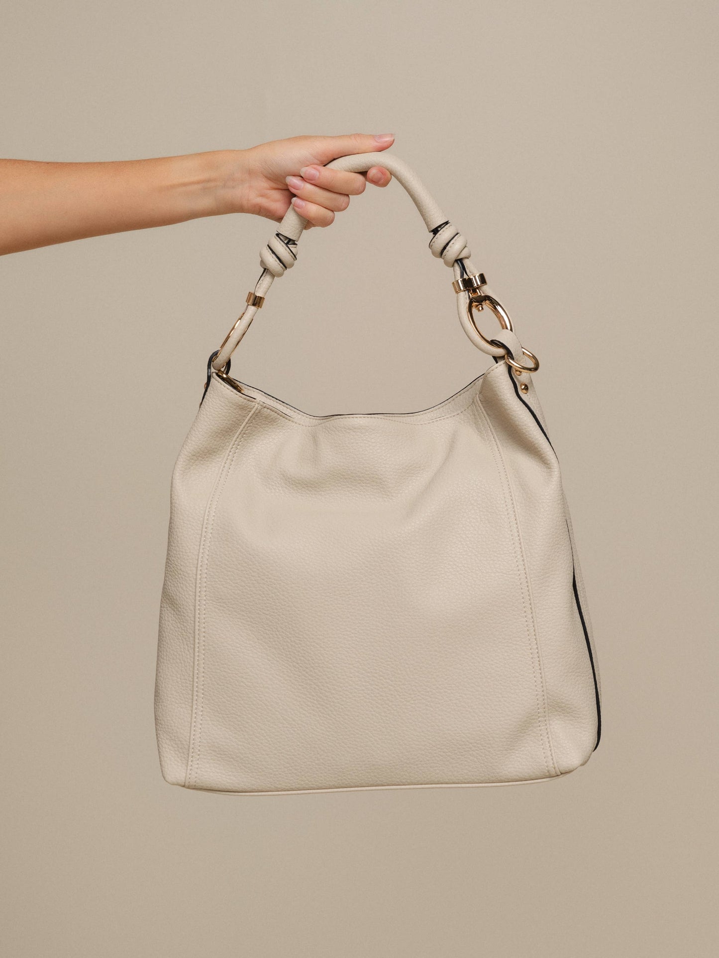 Borsa hobo in ecopelle con manico intrecciato