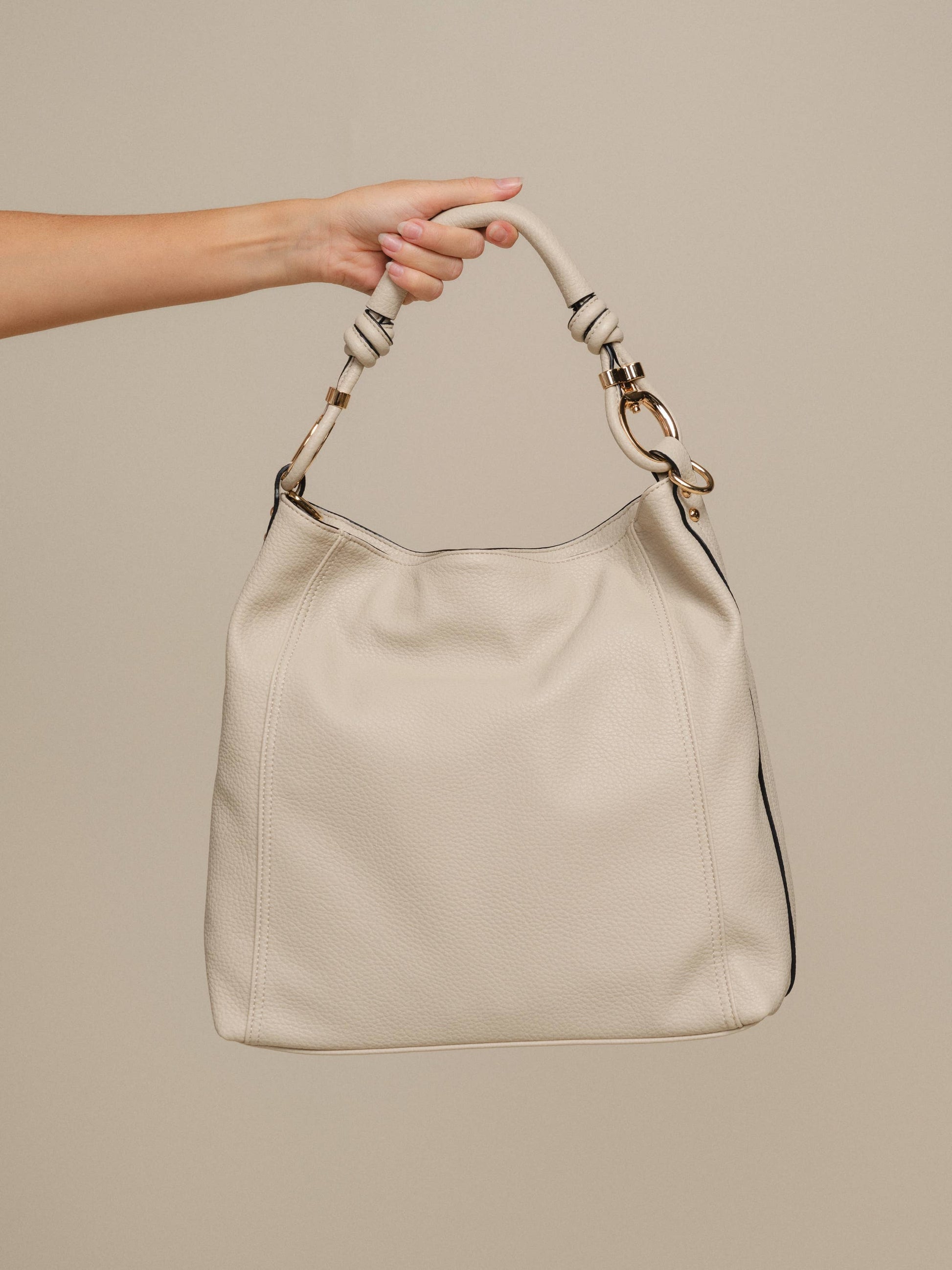 Borsa hobo in ecopelle con manico intrecciato