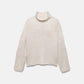 Maglione a trecce con collo alto