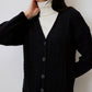 Completo in maglia con gonna midi e cardigan