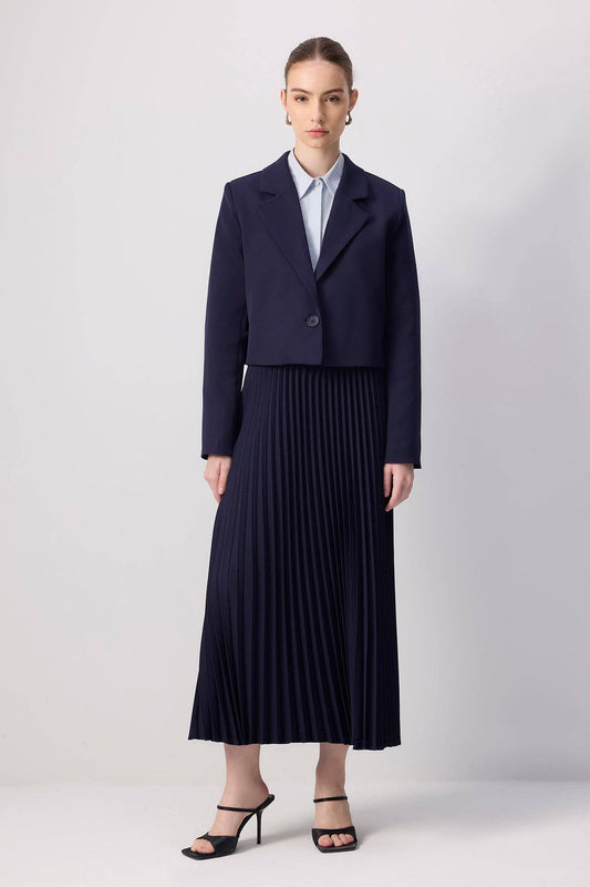 Completo gonna plissé e giacca corta elegante