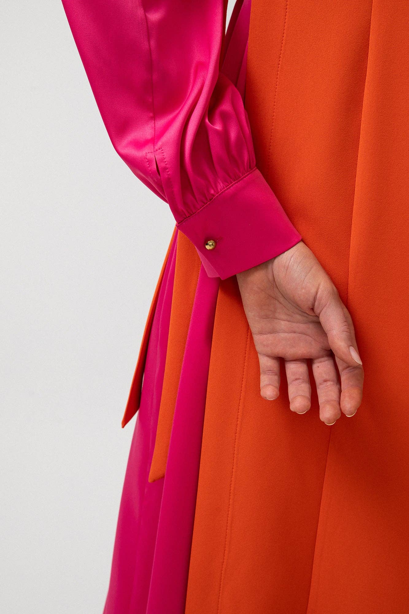 Abito lungo color block con fiocco laterale