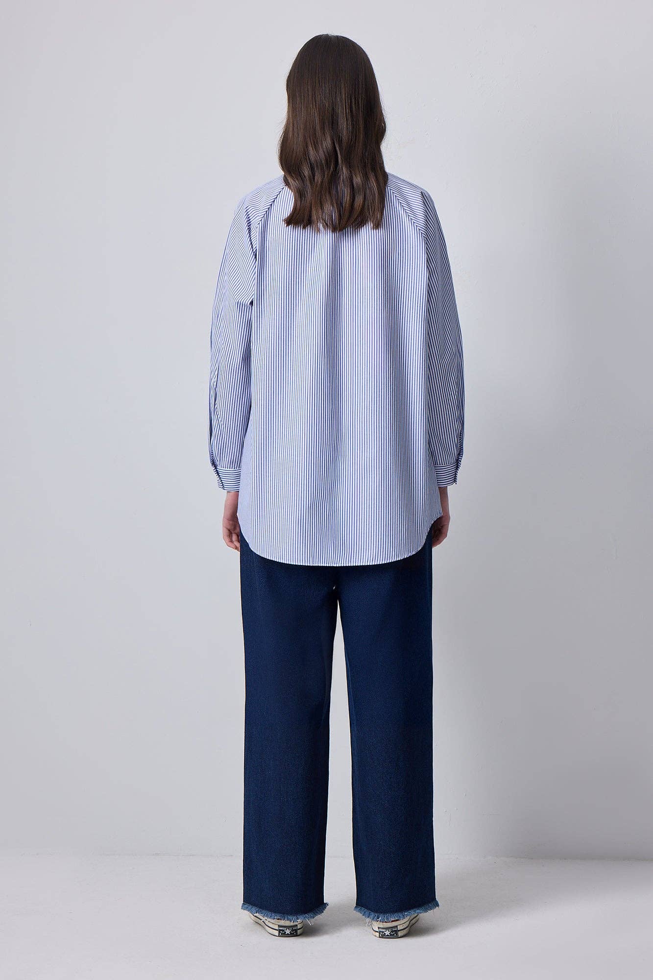 Camicia a righe con collo a fiocco