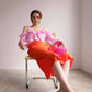 Blusa corta off-shoulder con volant e bottoni