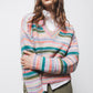 Maglione a righe in maglia con scollo a V