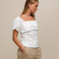 Blusa con scollo quadrato e maniche a sbuffo