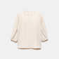 Blusa con pieghe e maniche a palloncino