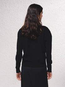 Maglione a maglia fine con scollo a V e tasche