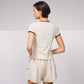 T-shirt bicolor con bordi a contrasto