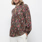 Blusa floreale con laccio al collo
