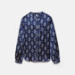 Blusa in raso stampato con bottoni