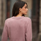Maglia rosa con scollo a V