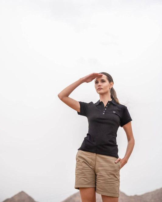 Polo donna nera in piqué antimacchia