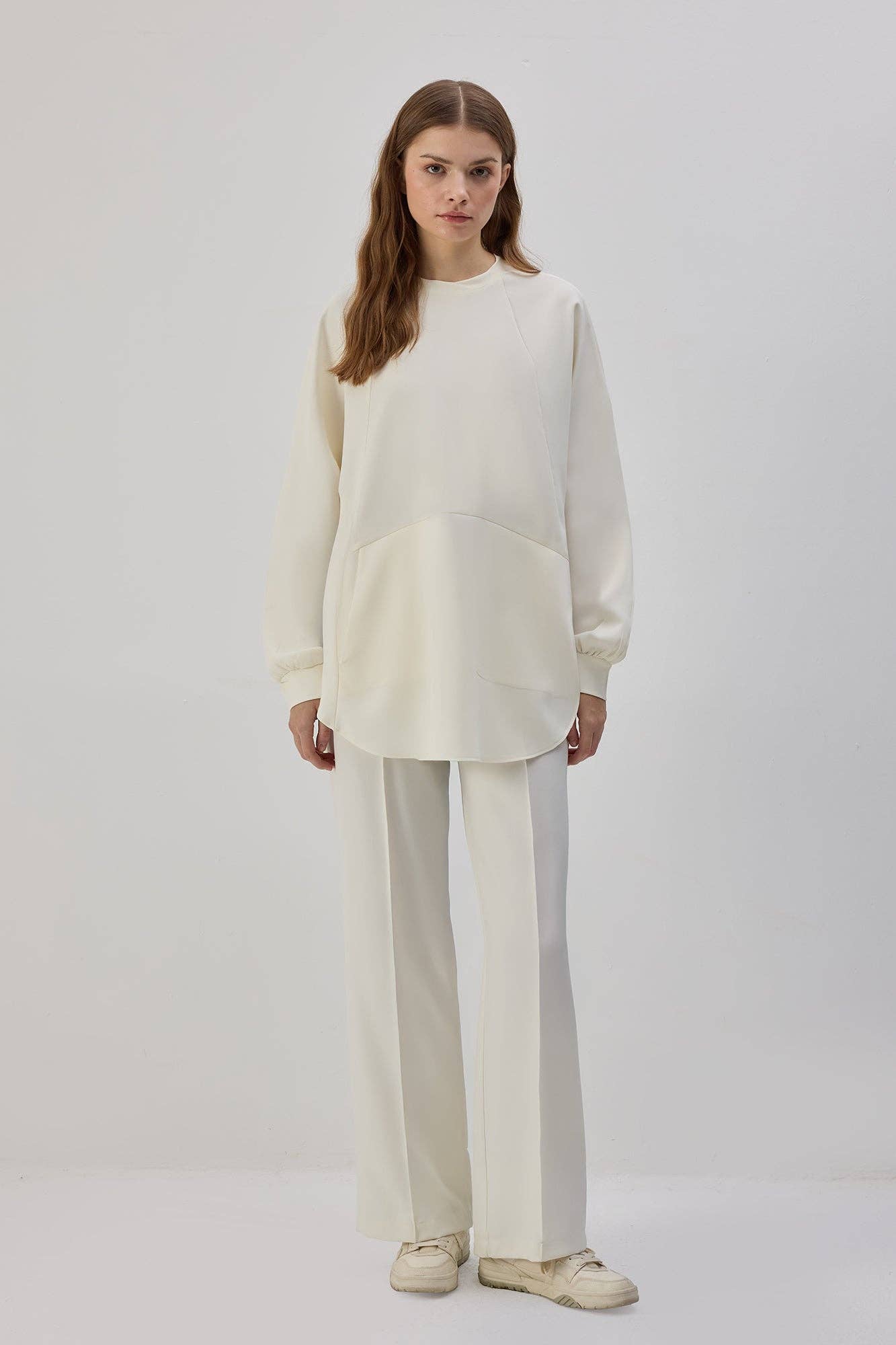 Tunica in crêpe con tasche