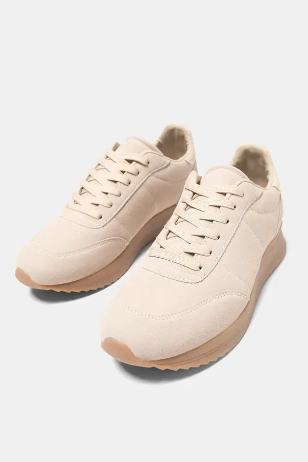 Sneakers bicolori con suola platform