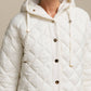 Cappotto trapuntato lungo con cappuccio