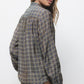 Blusa con motivo geometrico e scollo a V