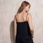 Top in raso con dettagli in pizzo